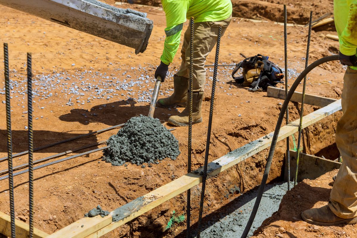 Professional concreting team working on driveway installation in Rowville